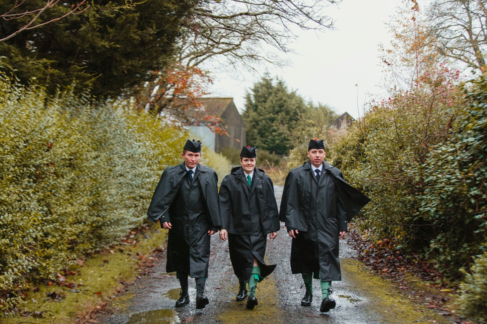 Bandspec raincape worn by pipe band, front view