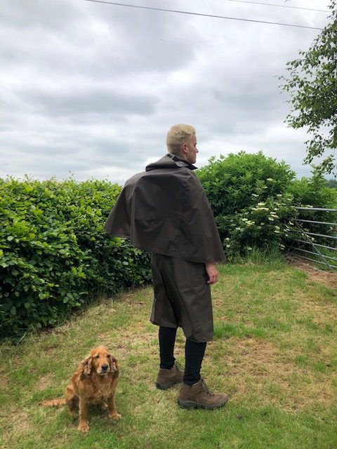 Walking and hiking raincape, back view